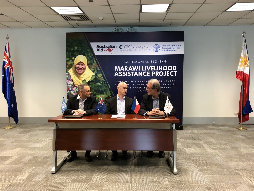 Mr Steven Muncy of CFSI, Mr José Luis Fernandez of FAO and the Australian Embassy’s Deputy Head of Mission, Mat Kimberley at the sidelines of the signing ceremony for the livelihood assistance project for Marawi.  CFSI and FAO’s support for enhancing agri-based livelihoods of internally displaced farmers is part of a broader AUD2.5 million package of assistance funded by the Australian Government and being implemented by CFSI.